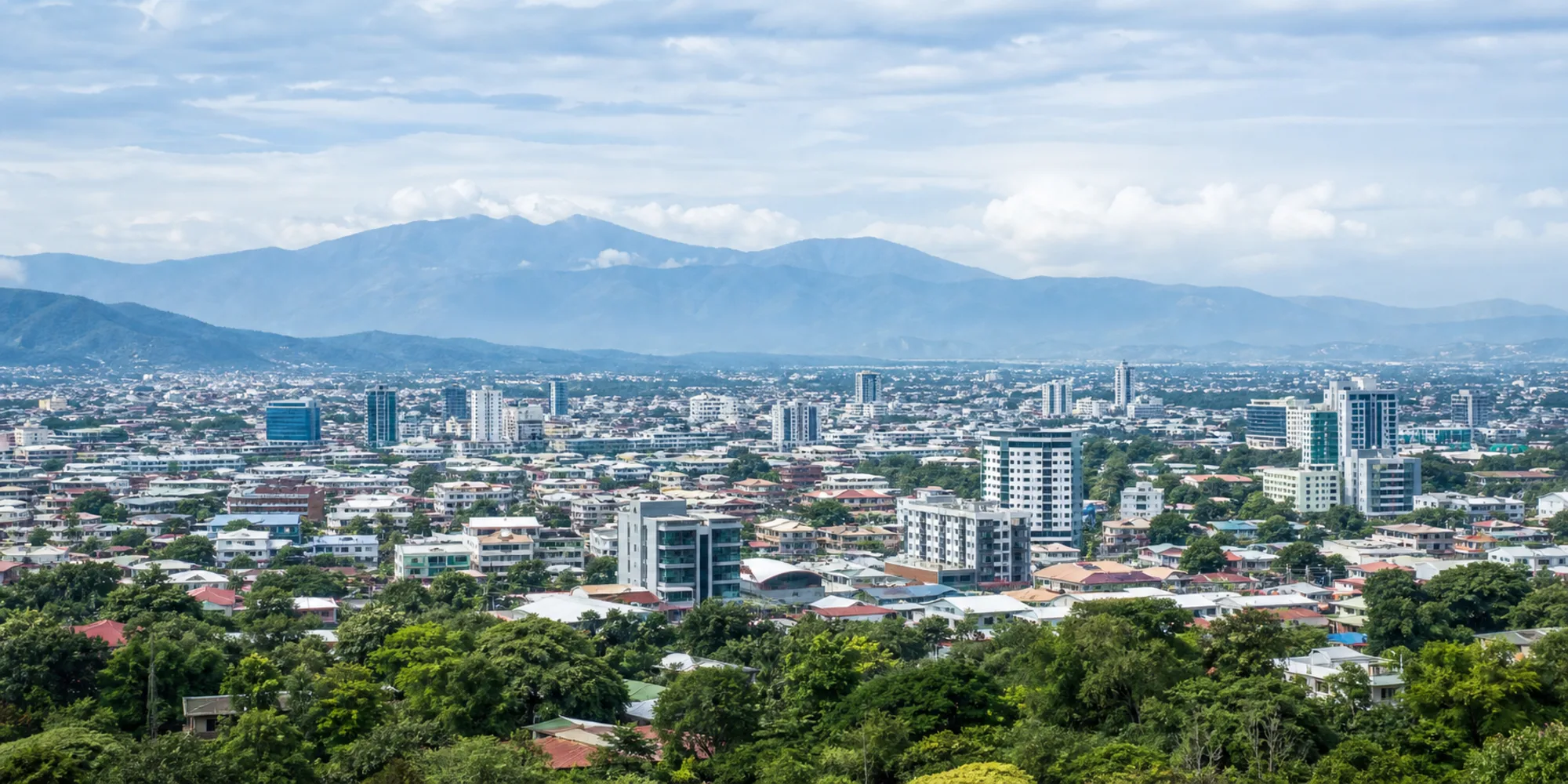 Costa Rica medical device registration workspace with San Jose skyline